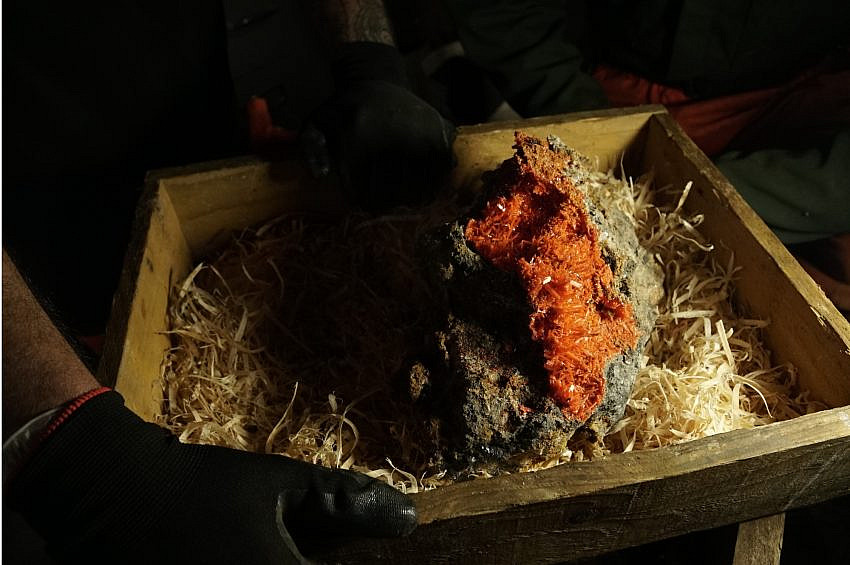 Large Crocoite crystal specimen which has bright orange crystals