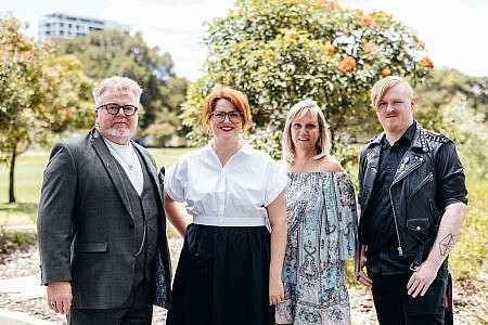 Writer Jamey Claffey (second from left) with members of Bill Warnock’s family – Adam, Kat and Hugh. Photographer: Tori Lill.